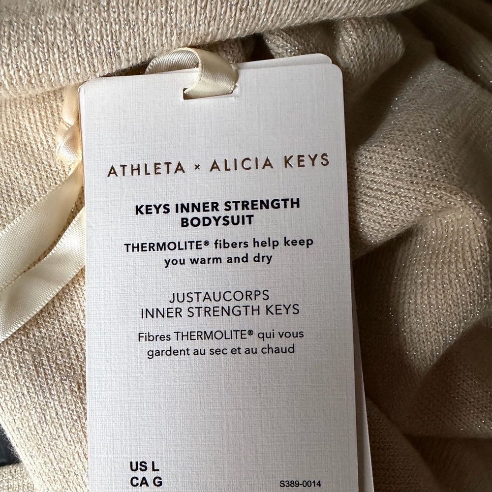 Large NWT - Athleta x Alicia Keys - Long Sleeve Cream/Gold Bodysuit - Picture 7 of 7
